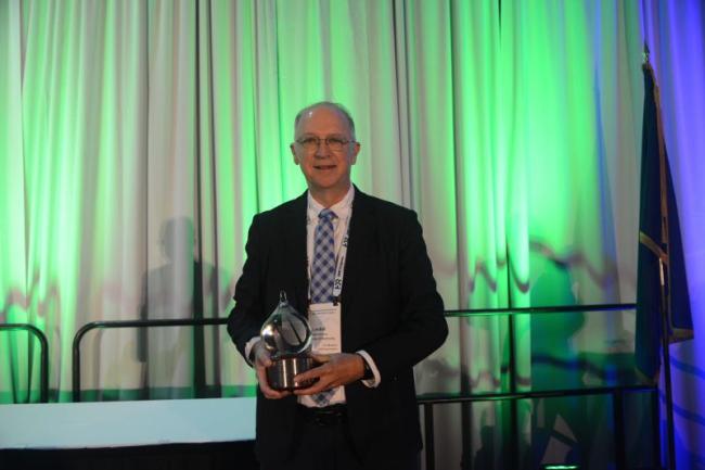 Ormsbee with lifetime achievement award at 2025 EWRI Congress 